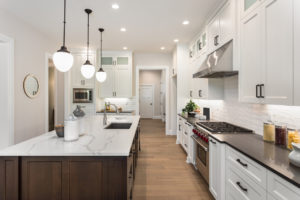 South Austin Rental Property with Hardwood Flooring and Granite Countertops in Their Upgraded Kitchen